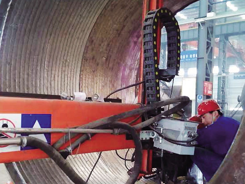 Pole stack welding machine